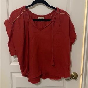 Red blouse with gold trimming